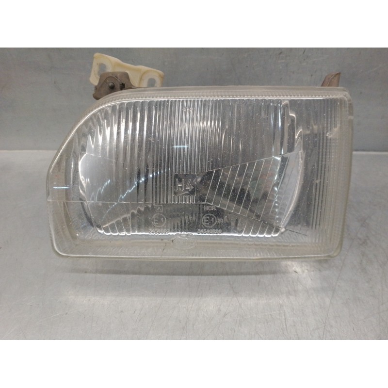 Recambio de faro izquierdo para ford orion 1.3 referencia OEM IAM 1058202  4 PUERTAS