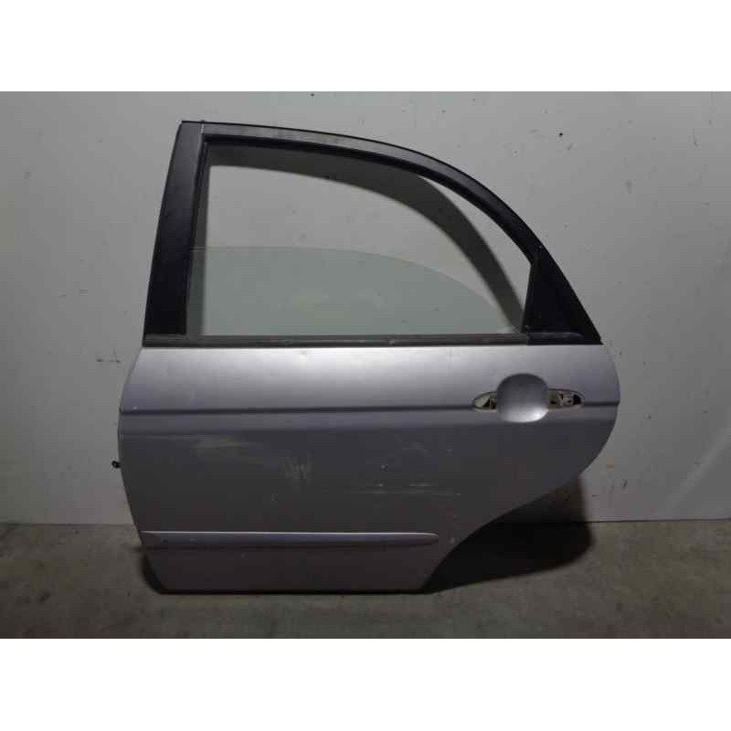 Recambio de puerta trasera izquierda para kia cerato 1.6 cat referencia OEM IAM  GRIS 4 PUERTAS