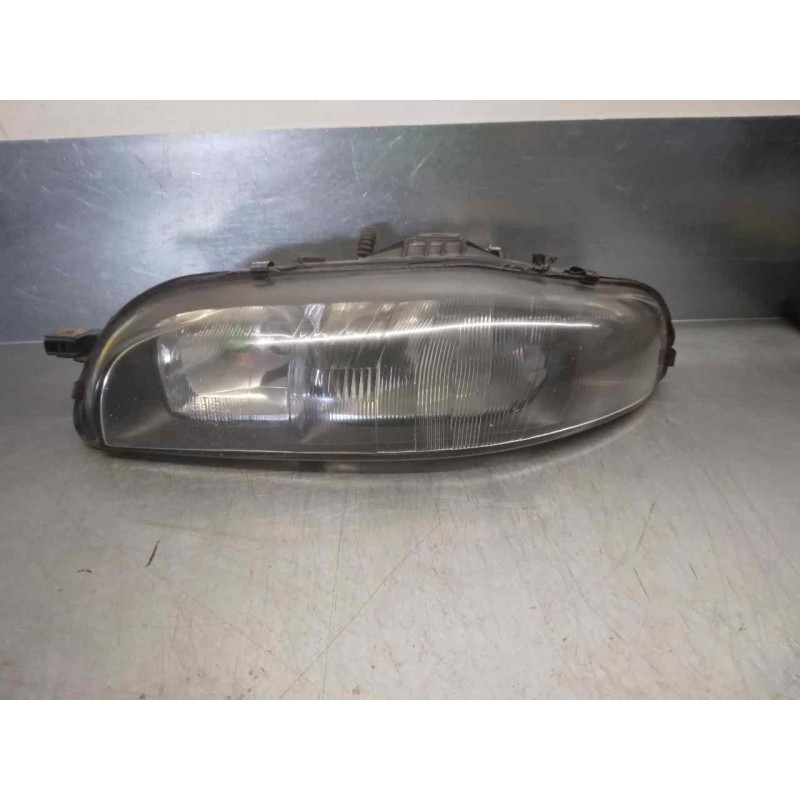 Recambio de faro izquierdo para fiat bravo (182) 1.6 16v / 16v 100 sx referencia OEM IAM 88201557SX  