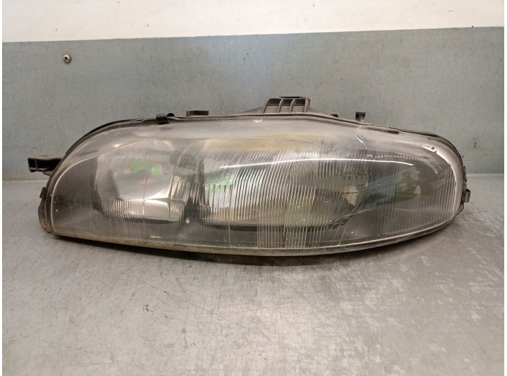 Replacement left headlight for Fiat Bravo (182) 1.9 turbodiesel OEM IAM reference 88201557SX 7767726 