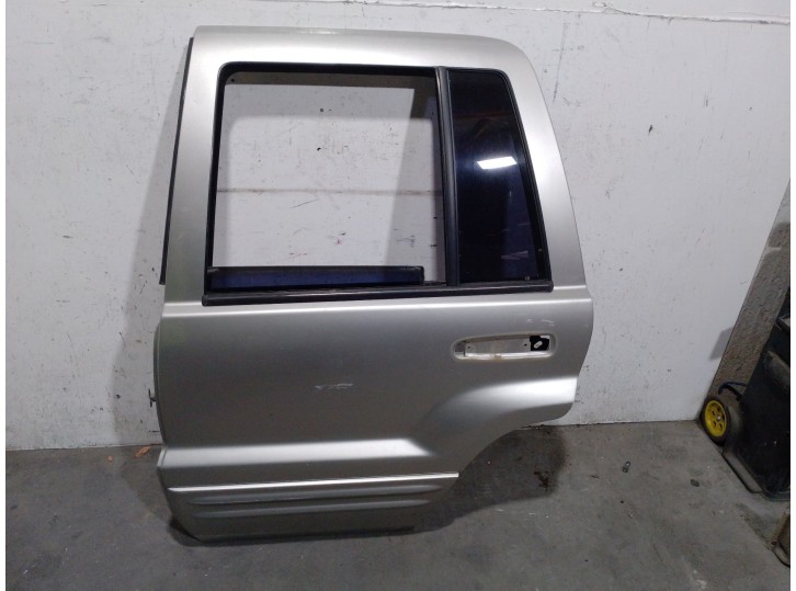 Replacement rear left door for Jeep Grand Cherokee (WJ/WG) 2.7 CRD CAT OEM IAM reference 55137065AD 