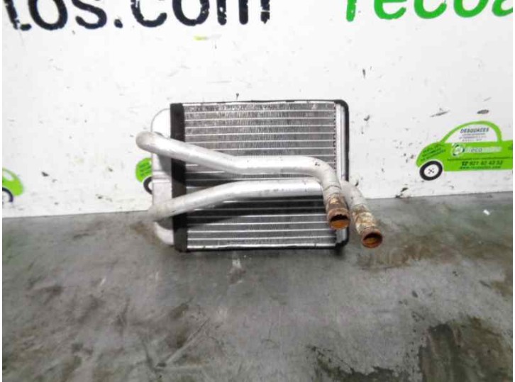 Recambio de radiador calefaccion / aire acondicionado para kia carens 1.8 cat referencia OEM IAM   