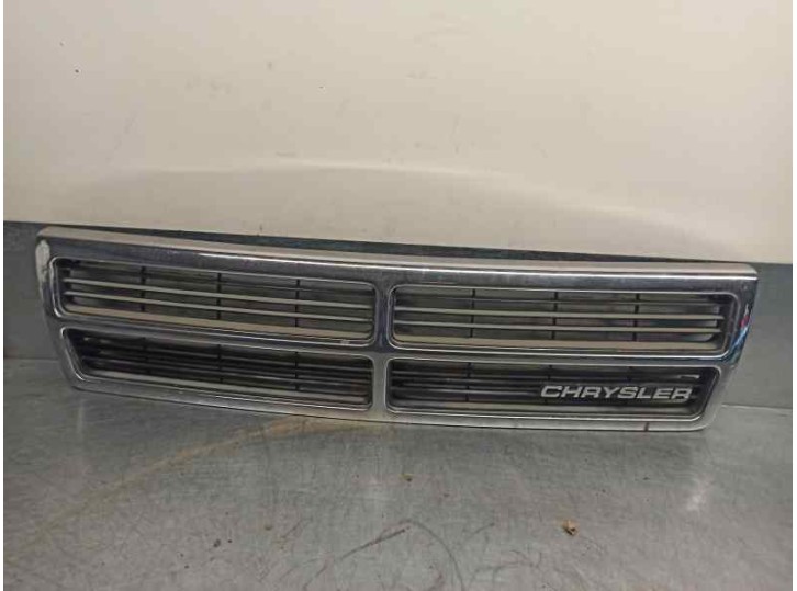 Replacement front grille for Chrysler Voyager (es) 3.3 cat OEM IAM reference 4576738 