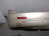 Rear bumper for SsangYong Kyron 2.0 XDi, OEM/IAM reference 7881009020EAO 7881009020EAO